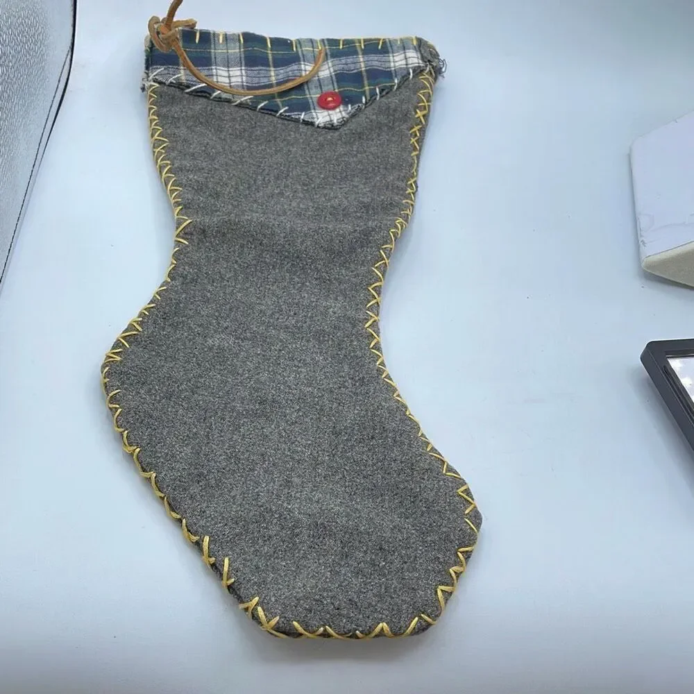 Vintage handmade grey wool Christmas stocking.